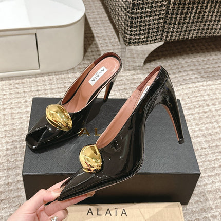 ALAIA SPIKE JEWEL MULES IN BLACK GLOSSY CALFSKIN WITH GOLD HARDWARE