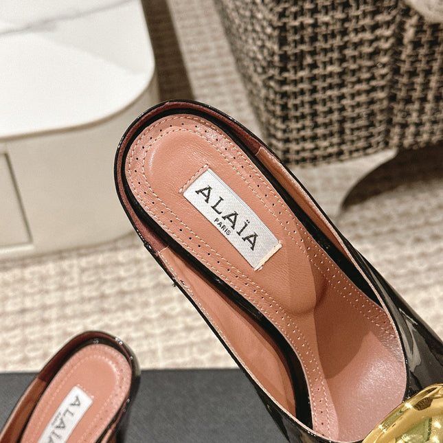 ALAIA SPIKE JEWEL MULES IN BLACK GLOSSY CALFSKIN WITH GOLD HARDWARE
