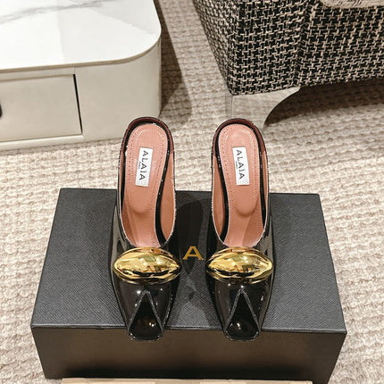 ALAIA SPIKE JEWEL MULES IN BLACK GLOSSY CALFSKIN WITH GOLD HARDWARE