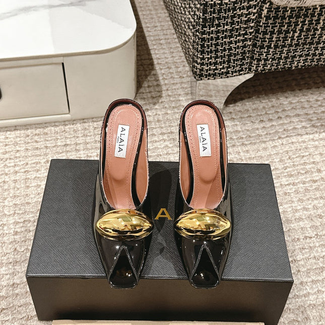 ALAIA SPIKE JEWEL MULES IN BLACK GLOSSY CALFSKIN WITH GOLD HARDWARE