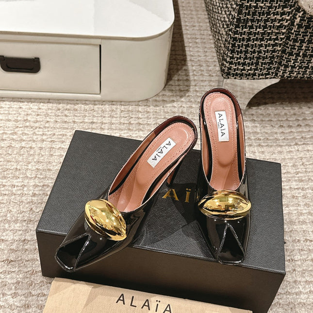 ALAIA SPIKE JEWEL MULES IN BLACK GLOSSY CALFSKIN WITH GOLD HARDWARE