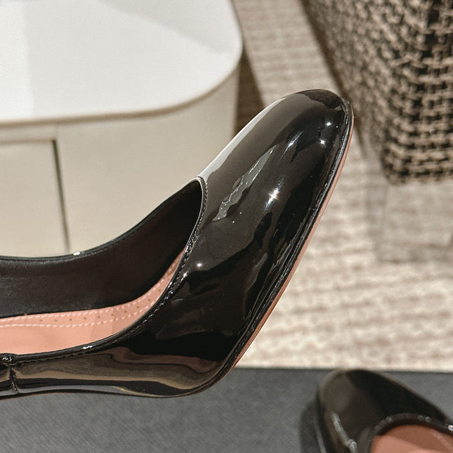 ALAIA ROUND-TOE HIGH HEELS 10 CM IN BLACK CALFSKIN