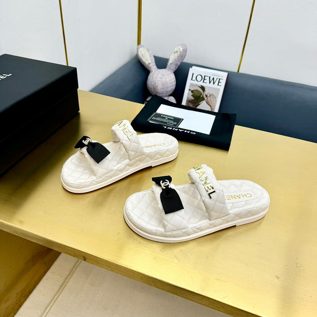 DAD SANDALS WITH BOW IN WHITE LAMBSKIN MULE