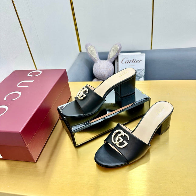 GG HIGH HEELS IN BLACK CALFSKIN GOLD-TONE HARDWARE WITH RHINESTONES