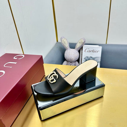 GG HIGH HEELS IN BLACK CALFSKIN GOLD-TONE HARDWARE WITH RHINESTONES