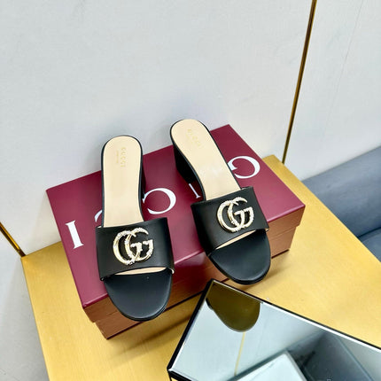 GG HIGH HEELS IN BLACK CALFSKIN GOLD-TONE HARDWARE WITH RHINESTONES