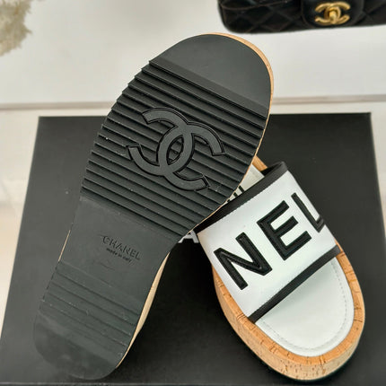 THICK SOLE LETTER SLIPPERS IN WHITE SHEEPSKIN