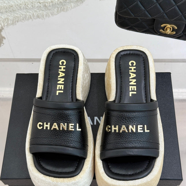 PLATFORM SLIPPERS IN BLACK LAMBSKIN