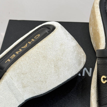 PLATFORM SLIPPERS IN BLACK LAMBSKIN