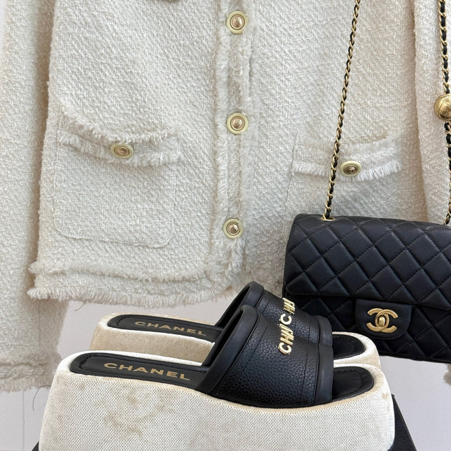 PLATFORM SLIPPERS IN BLACK LAMBSKIN