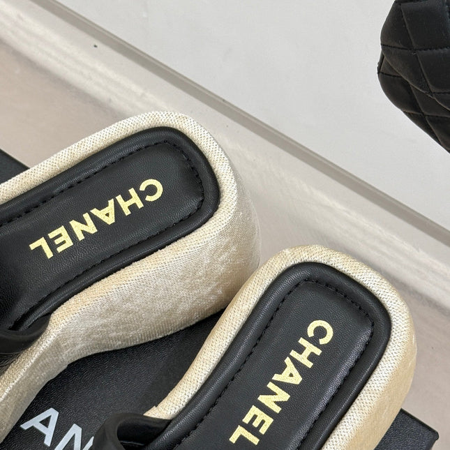 PLATFORM SLIPPERS IN BLACK LAMBSKIN