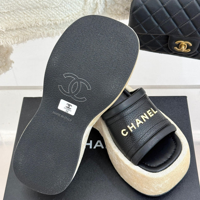 PLATFORM SLIPPERS IN BLACK LAMBSKIN