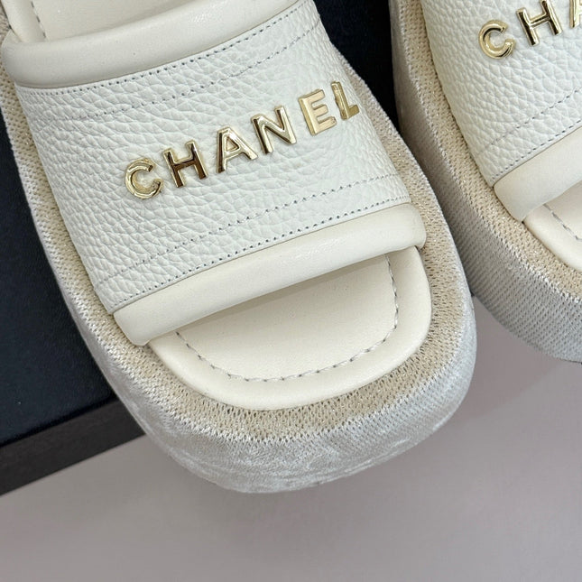 PLATFORM SLIPPERS IN WHITE LAMBSKIN