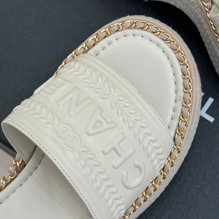 THICK SOLE WEDGE SLIPPERS IN WHITE CALFSKIN