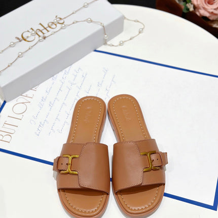 MARCIE SLIDE IN BRONZE BROWN CALFSKIN WITH GOLD HARDWARE