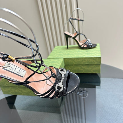 CRYSTAL HORSEBIT STRAPPY SANDAL 10.5CM IN BLACK PATENT LEATHER