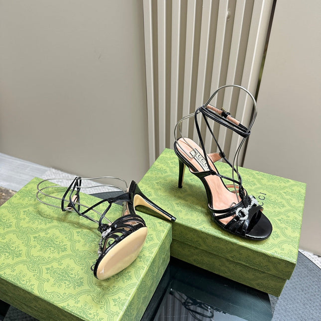 CRYSTAL HORSEBIT STRAPPY SANDAL 10.5CM IN BLACK PATENT LEATHER