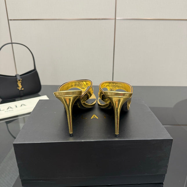 ALAIA HEELED THONG 25S IN GOLD PATENT LEATHER