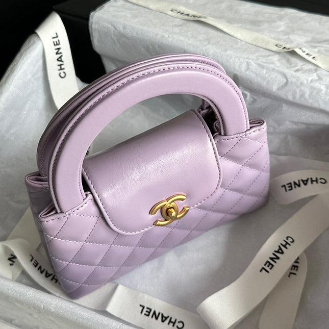 CHANEL VINTAGE KELLY 25S 19 CM IN PURPLE LAMBSKIN WITH GOLD HARDWARE