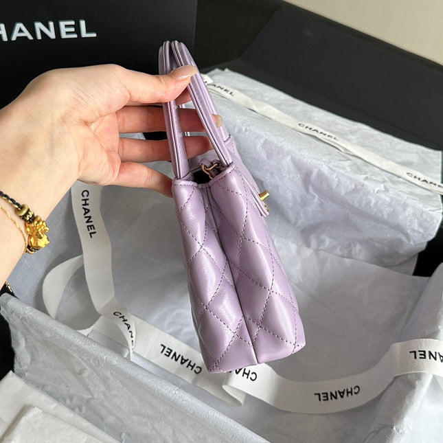 CHANEL VINTAGE KELLY 25S 19 CM IN PURPLE LAMBSKIN WITH GOLD HARDWARE