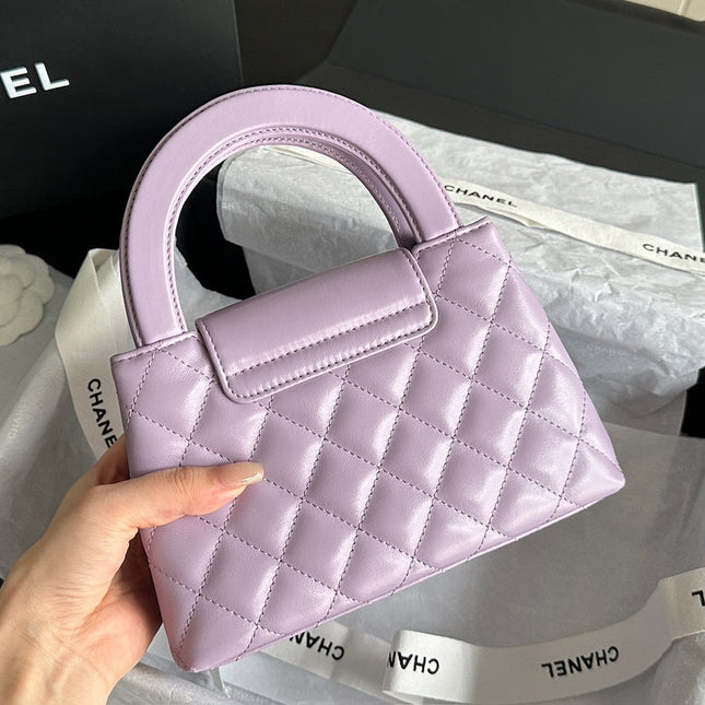 CHANEL VINTAGE KELLY 25S 19 CM IN PURPLE LAMBSKIN WITH GOLD HARDWARE