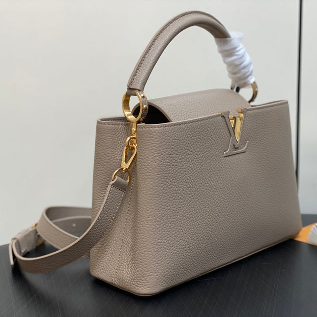 CAPUCINES MM 31 IN KHAKI BROWN TAURILLON