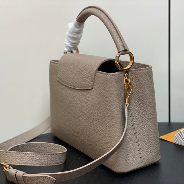 CAPUCINES MM 31 IN KHAKI BROWN TAURILLON