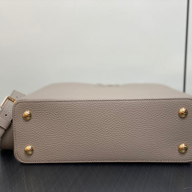 CAPUCINES MM 31 IN KHAKI BROWN TAURILLON