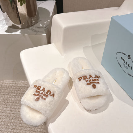 PRADA 25S FLAT MULES IN WHITE RABBIT FUR