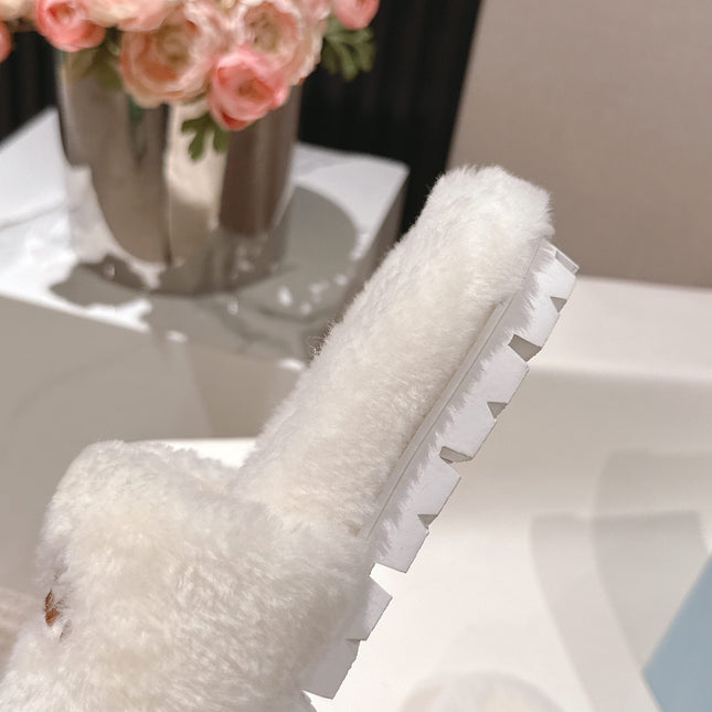 PRADA 25S FLAT MULES IN WHITE RABBIT FUR