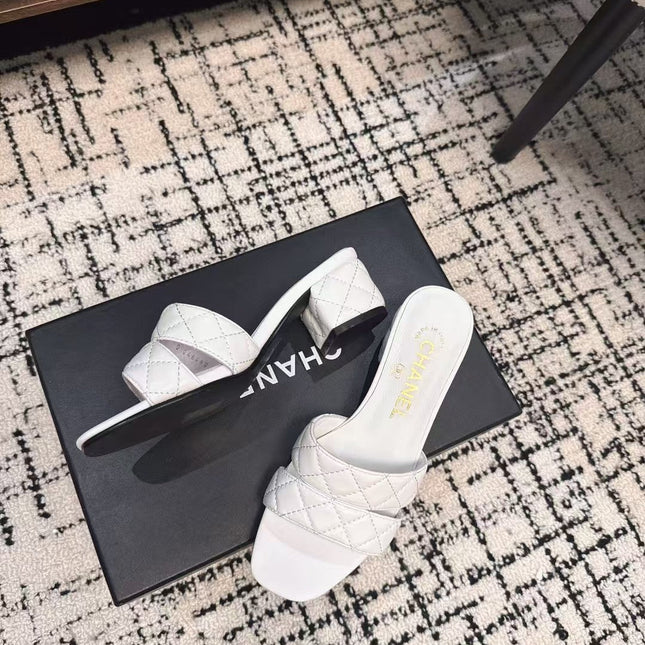 MID HEEL MULES IN WHITE SHEEPSKIN