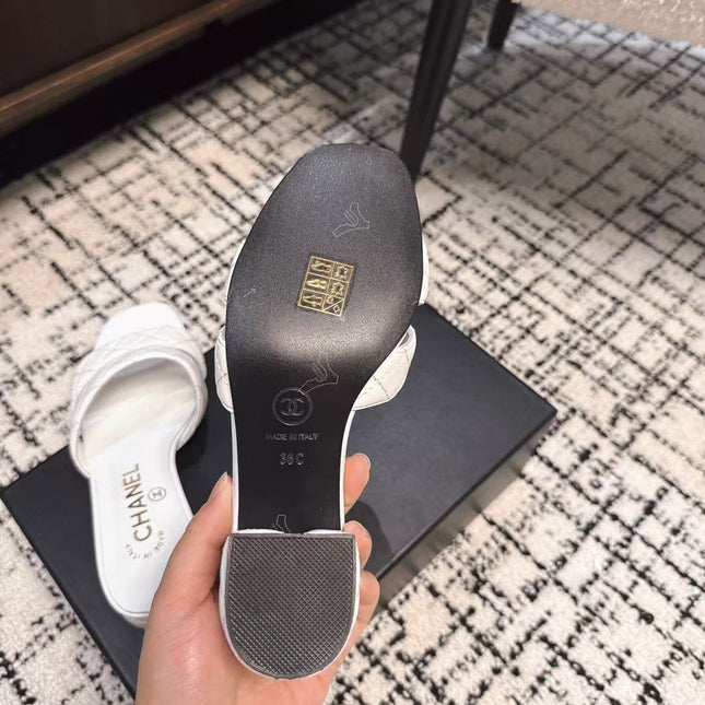 MID HEEL MULES IN WHITE SHEEPSKIN