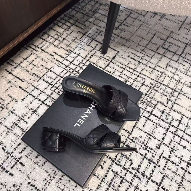 MID HEEL MULES IN BLACK SHEEPSKIN