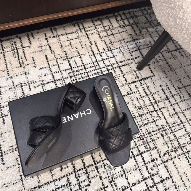 MID HEEL MULES IN BLACK SHEEPSKIN