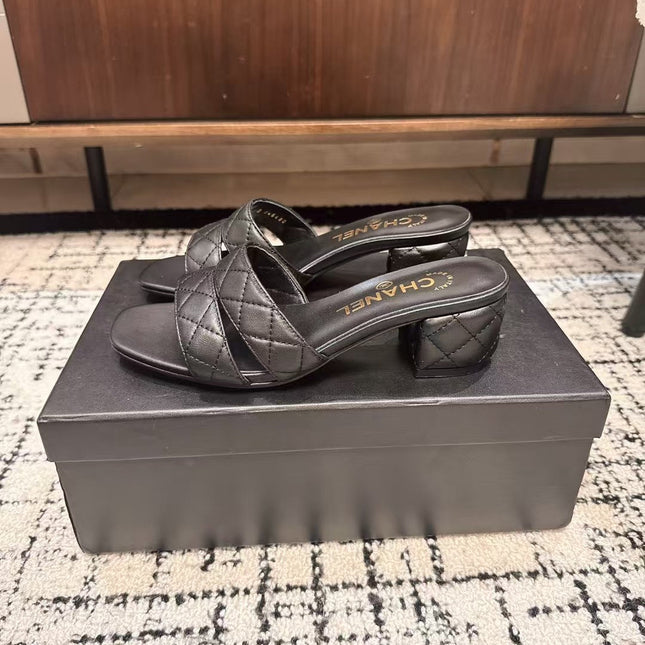 MID HEEL MULES IN BLACK SHEEPSKIN