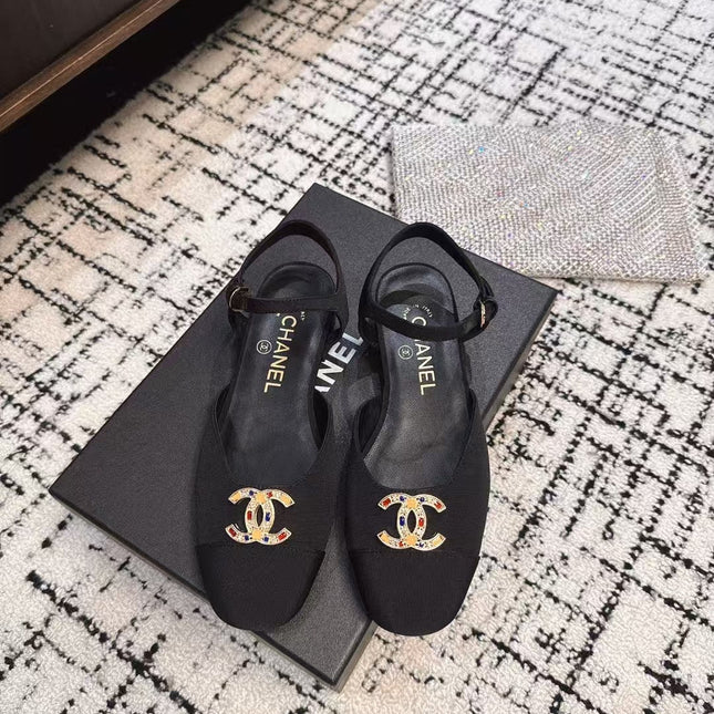 FLAT SLINGBACKS IN BLACK FABRIC