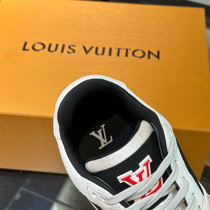 LV TRAINER SNEAKERS IN WHITE CALFSKIN AND BLACK SUEDE
