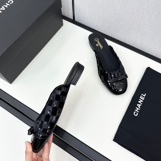 BOW MULE IN BLACK FABRIC AND CALFSKIN