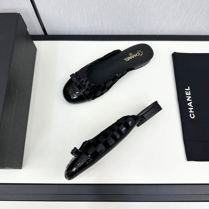 BOW MULE IN BLACK FABRIC AND CALFSKIN