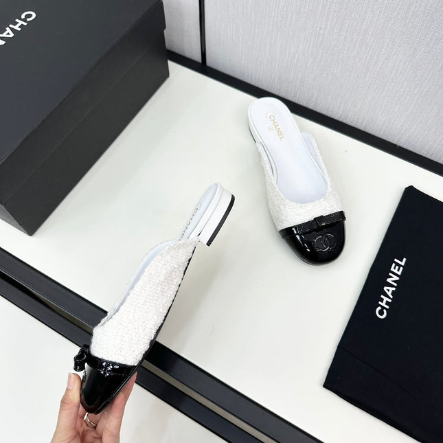 BOW MULE IN WHITE FUR AND BLACK CALFSKIN