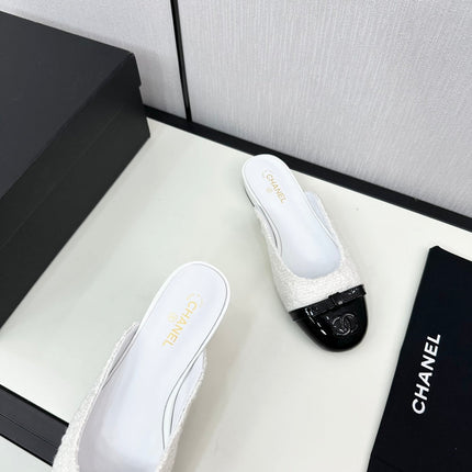 BOW MULE IN WHITE FUR AND BLACK CALFSKIN