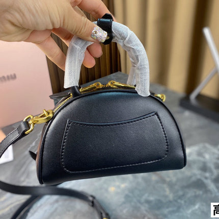 HALF - MOON BAG 18 IN BLACK CALFSKIN