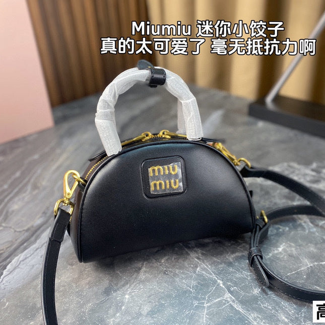 HALF - MOON BAG 18 IN BLACK CALFSKIN