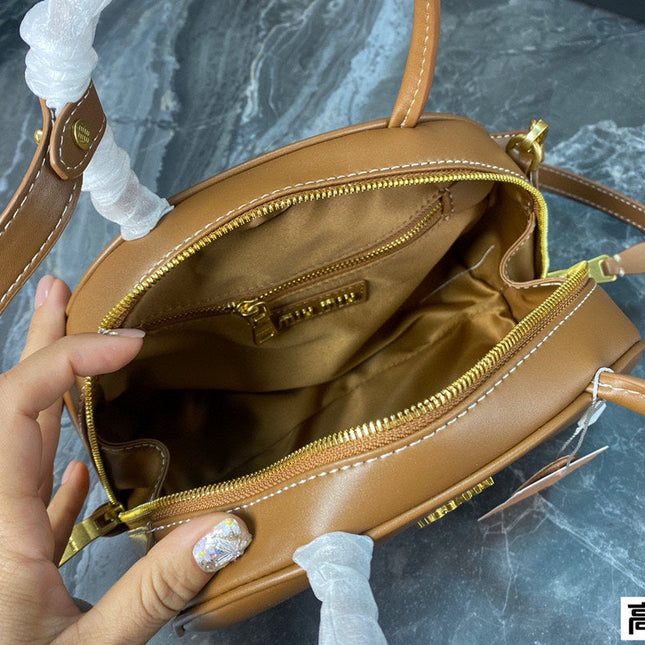 HALF - MOON BAG 23 IN CARAMEL BROWN CALFSKIN