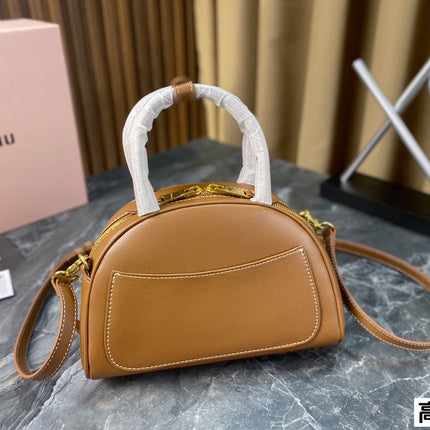 HALF - MOON BAG 23 IN CARAMEL BROWN CALFSKIN