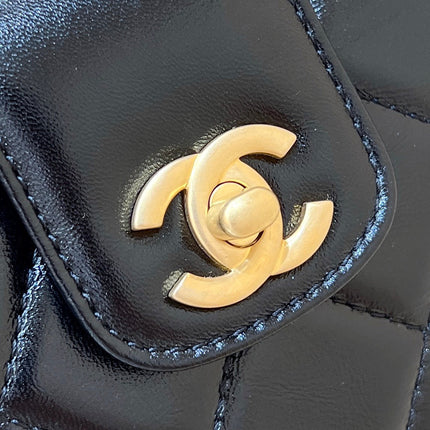 MEDIUM TOP HANDLE BAG 23 IN BLACK OIL-WAX LAMBSKIN GOLD HARDWARE