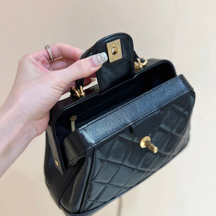 MEDIUM TOP HANDLE BAG 23 IN BLACK OIL-WAX LAMBSKIN GOLD HARDWARE