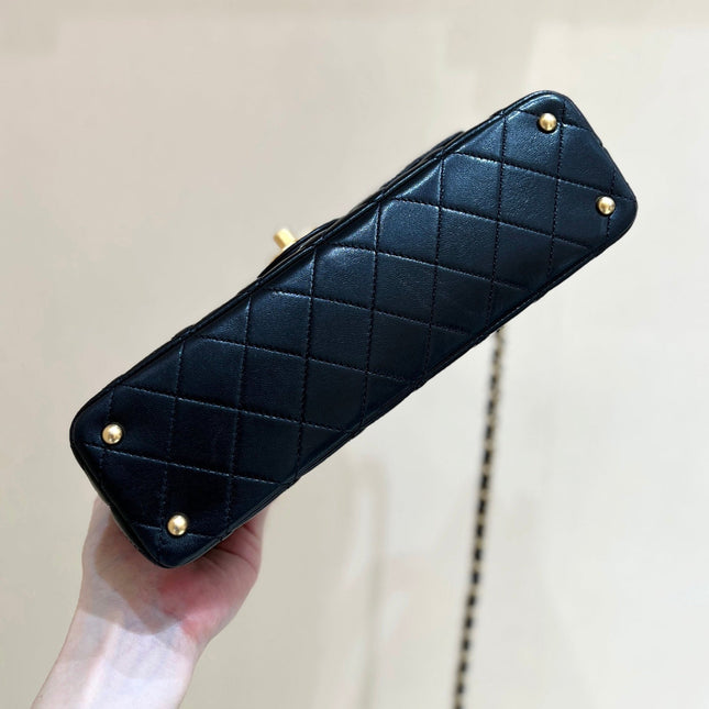 QUILTED FLAP BAG WITH HANDLE 26 IN BLACK LAMBSKIN GOLD PLATED METAL