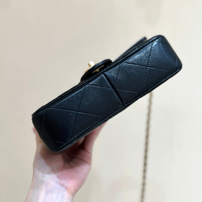 PEARL LIMITED EDITION FLAP BAG WITH HANDLE 20 IN BLACK LAMBSKIN