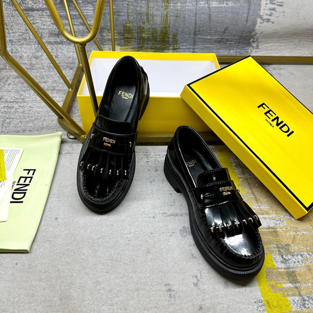 FENDI BAGUETTE LOAFERS IN BLACK CALFSKIN WITH GOLD HARDWARE